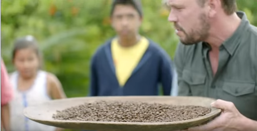 Jimmy Doherty holds a platter of freshly roasted beans