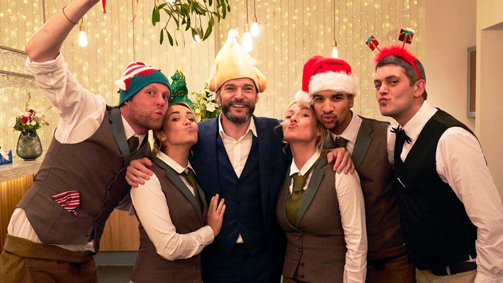 The first dates talent posing in christmas hats 