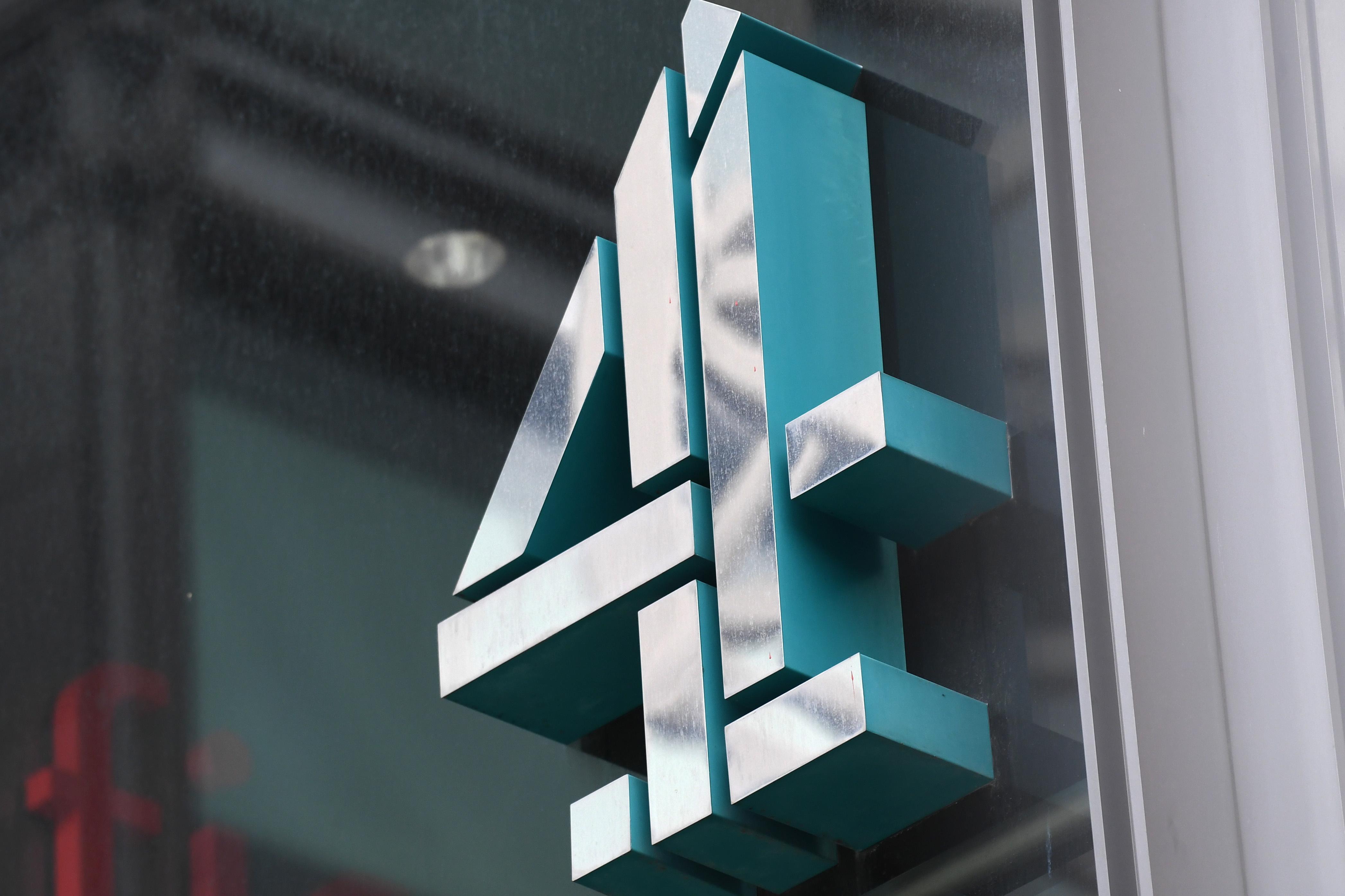C4 logo on wall of building 
